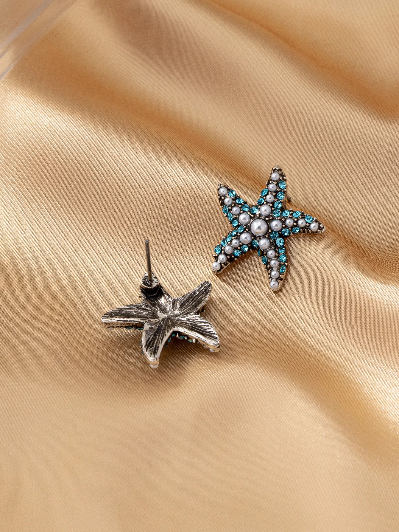 עגילים דגם ים